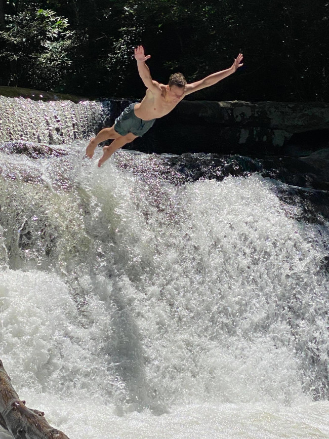 boy-on-a-nice-waterfall-dive